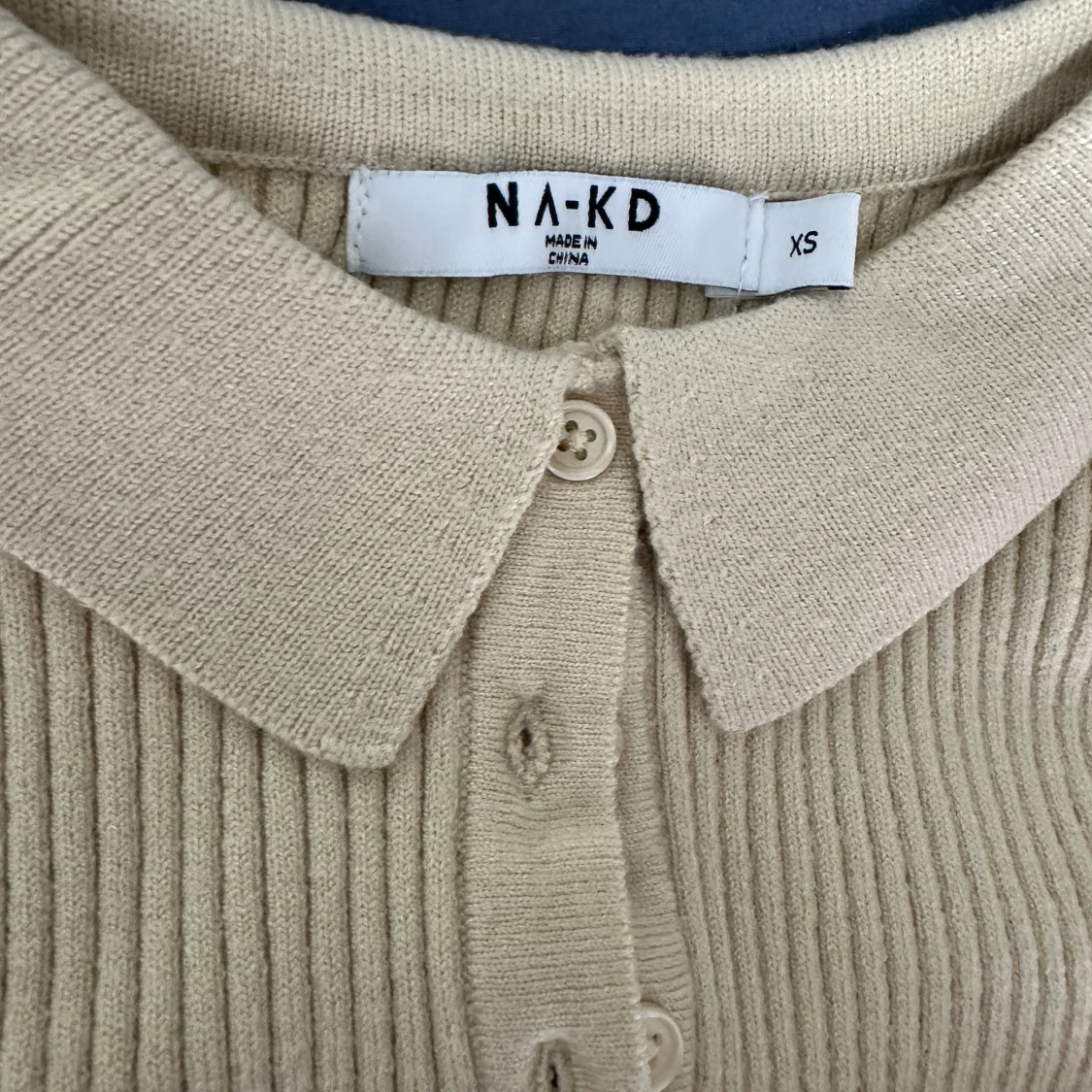 Beige ribbad polotröja från NA-KD - 91