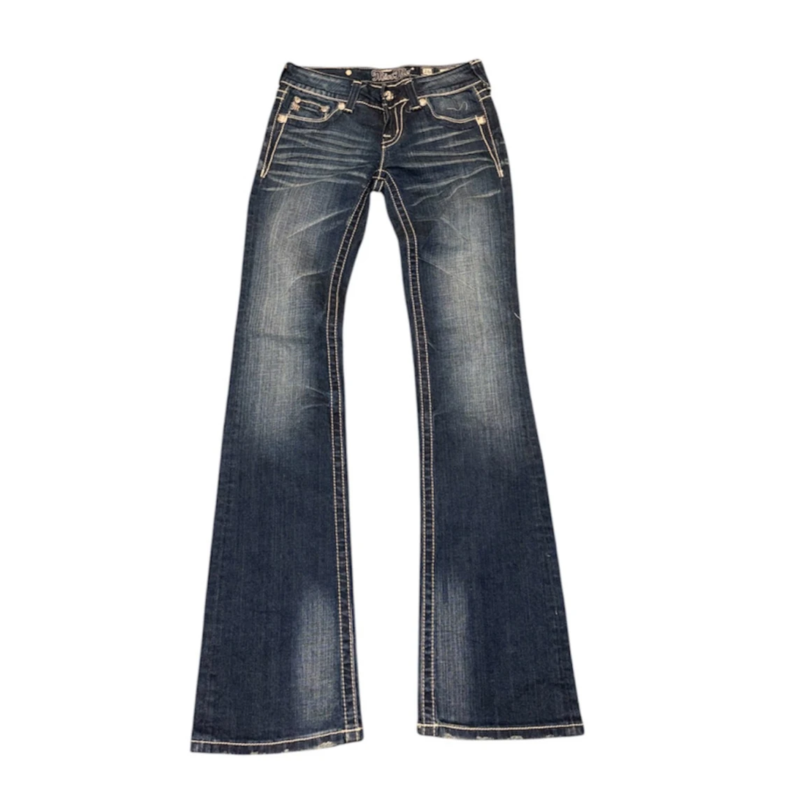 Blå jeans med broderade detaljer - 90