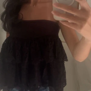 kjol/topp - svart spetskjol som även kan användas som topp! 