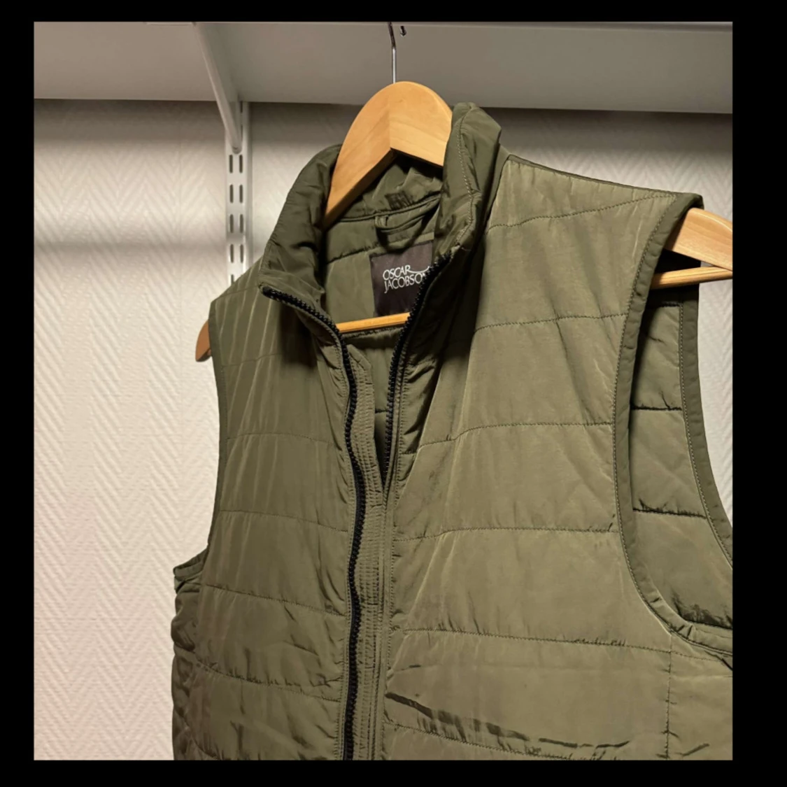 Grön väst från Oscar Jacobson