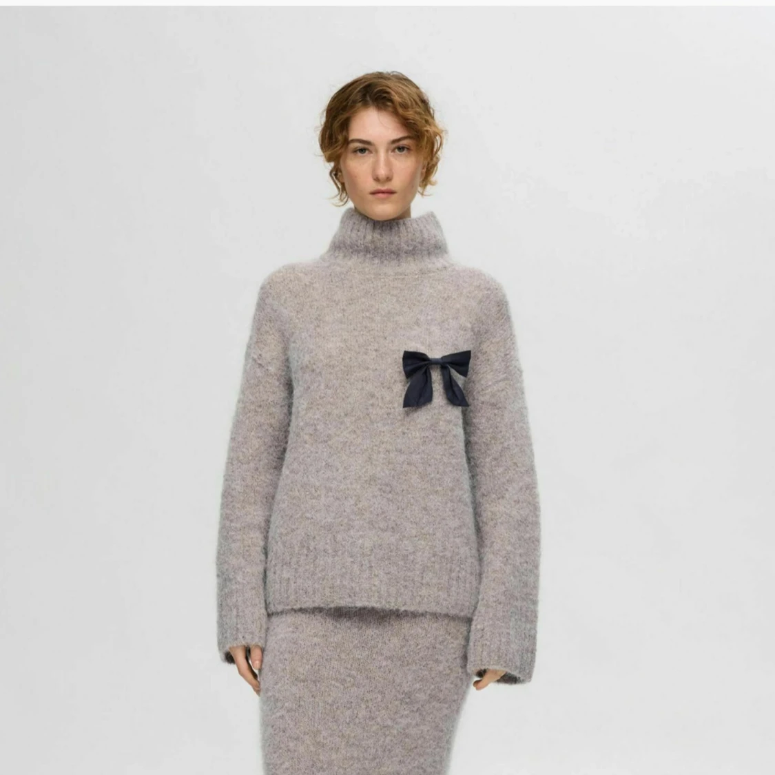 Stickad polotröja i alpacka