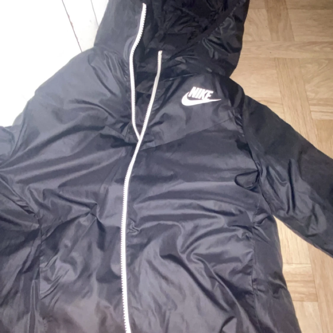 Svart dunjacka från Nike - 92
