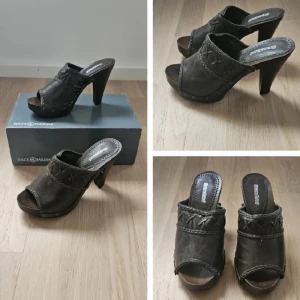 Bruna klackskor från Graceland  - Snygga bruna klackskor från Graceland öppen tå och flätade detaljer. Skorna har en hög klack och är perfekta för att ge lite extra höjd och stil.Storlek 36, klackhöjd 9 cm. Skorna är oanvända och i mycket fint skick. 