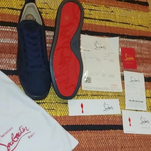 Navy blue Louboutins - Snygga blå sneakers från Christian Louboutin.