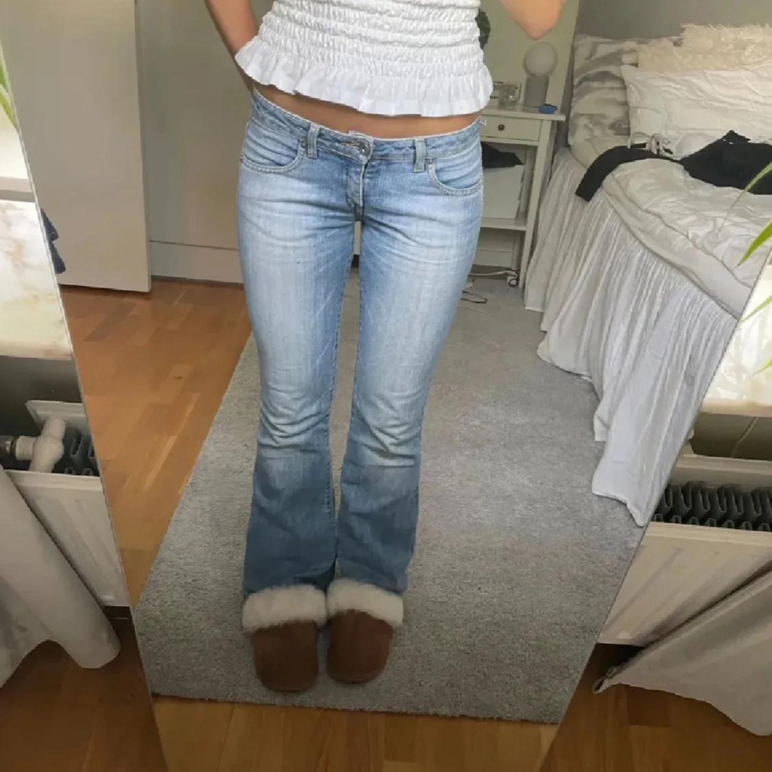 Ljusblå lågmidjade bootcut jeans - 91