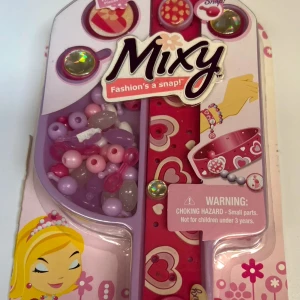Mixy - Fashion’s a snap! - Mixy - Fashion’s a snap!, Helt nytt & Rekommenderas för dig med barn som behöver underhållning!