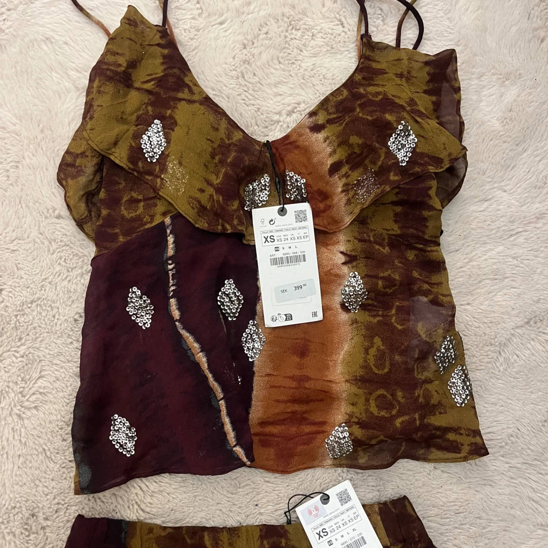 Mönstrat sett med paljetter - 90