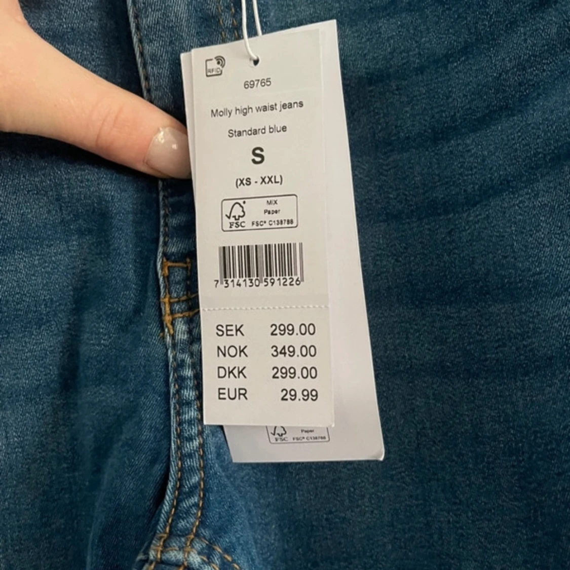 Blå högmidjade jeans - 1