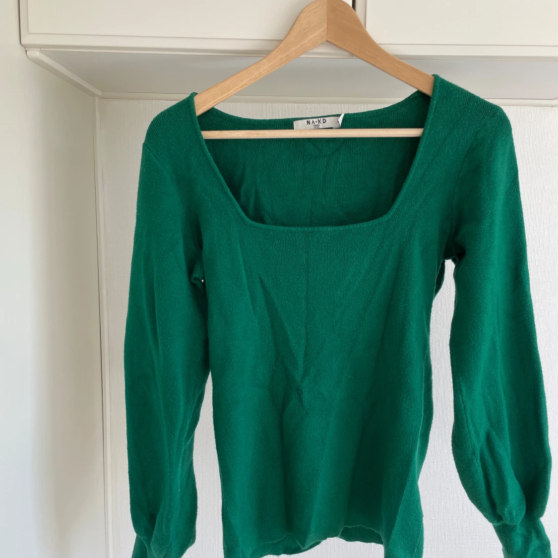 Stickad tröja M-L  - 90