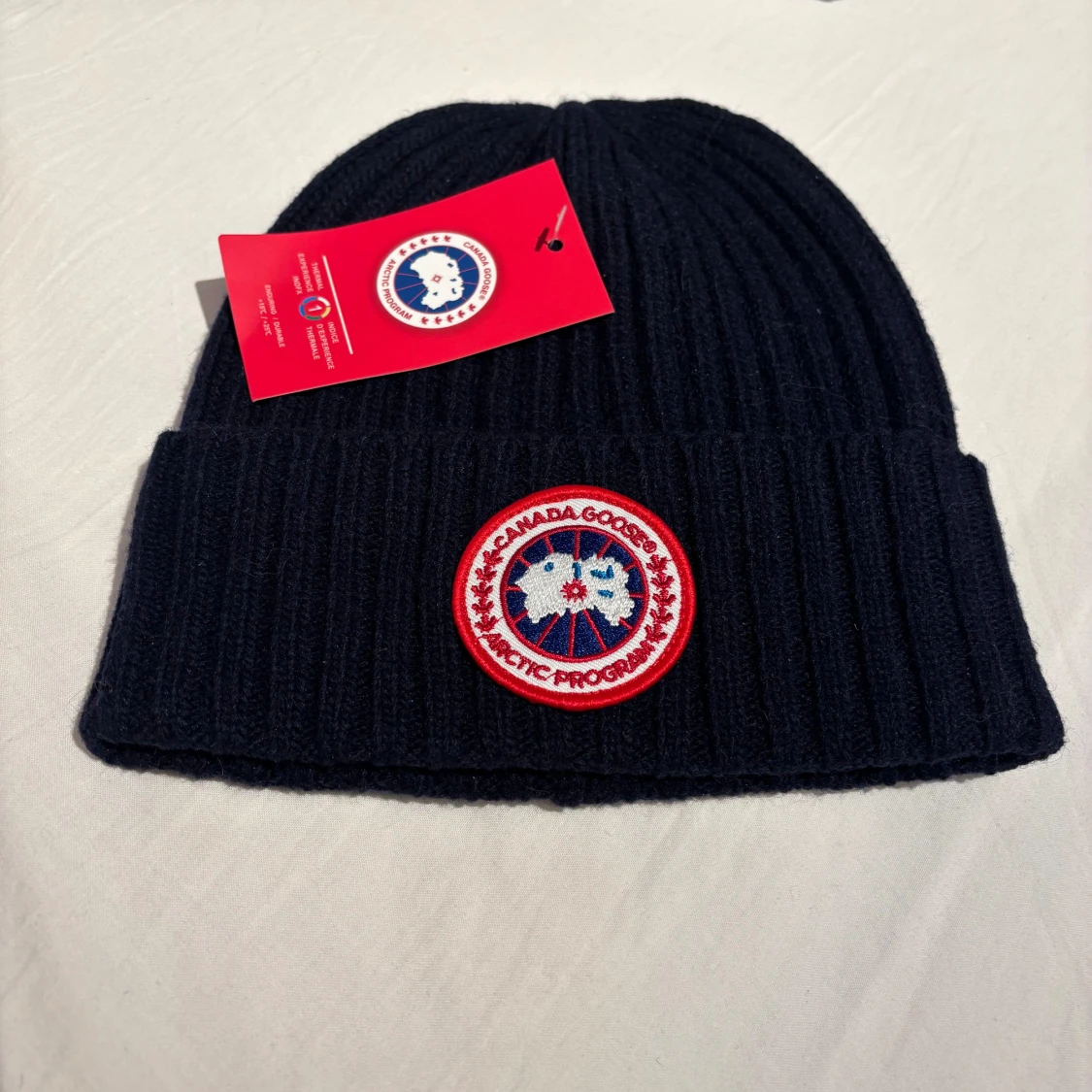 Mörkblå mössa Canada Goose