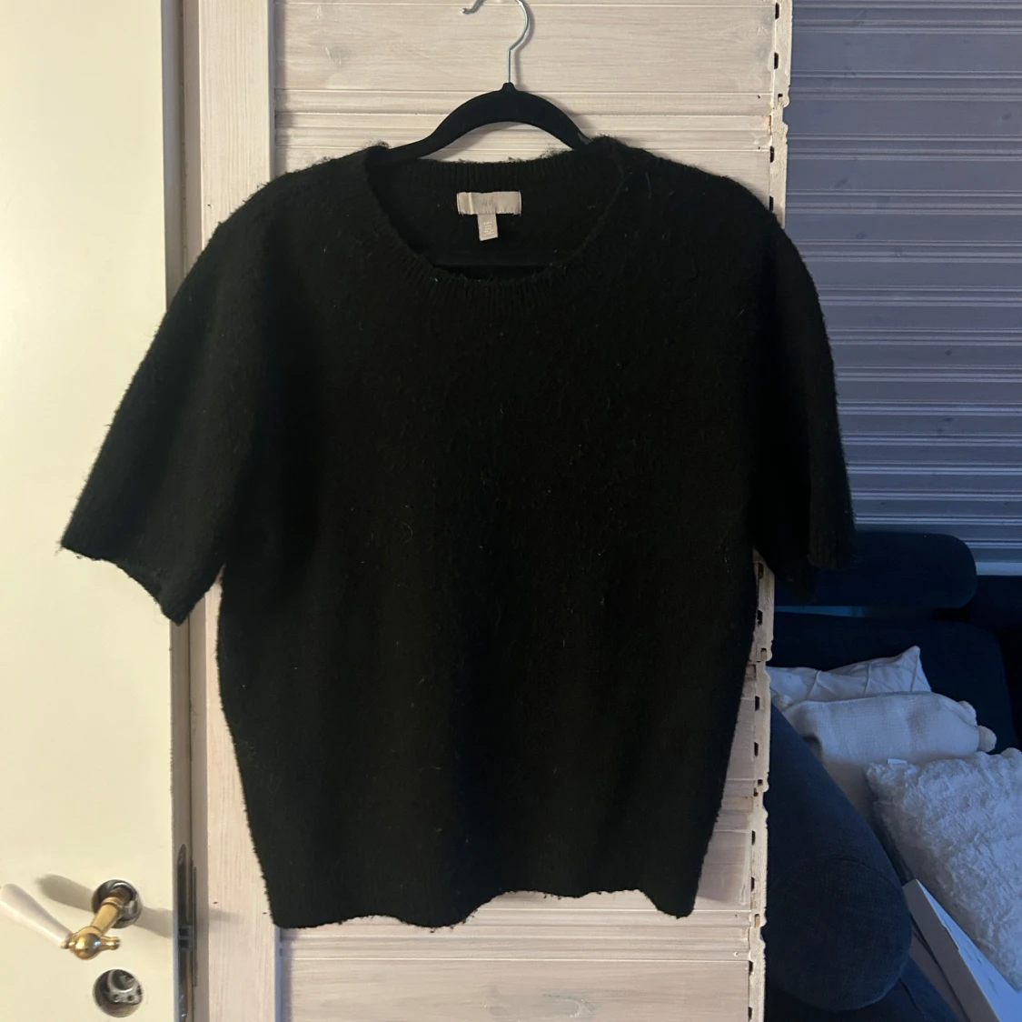 Svart tröja med korta ärmar