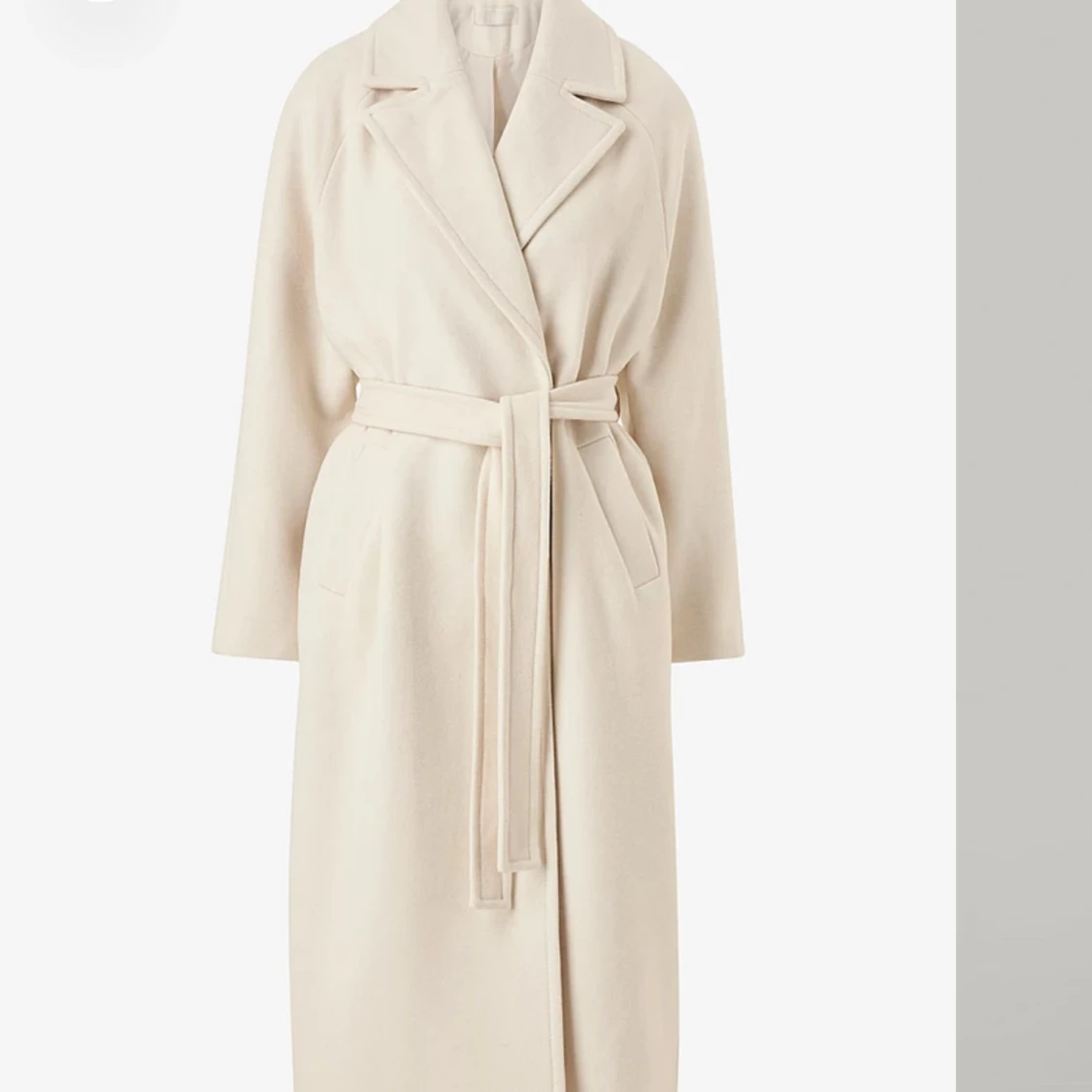 Beige krämvit kappa 