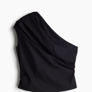 Svart oneshoulder topp - Snygg svart oneshoulder topp i ett stilrent och modernt snitt. Perfekt för en trendig look.
