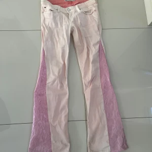 Rosa leopard jeans  - Lågmidjade. Använda en gång 