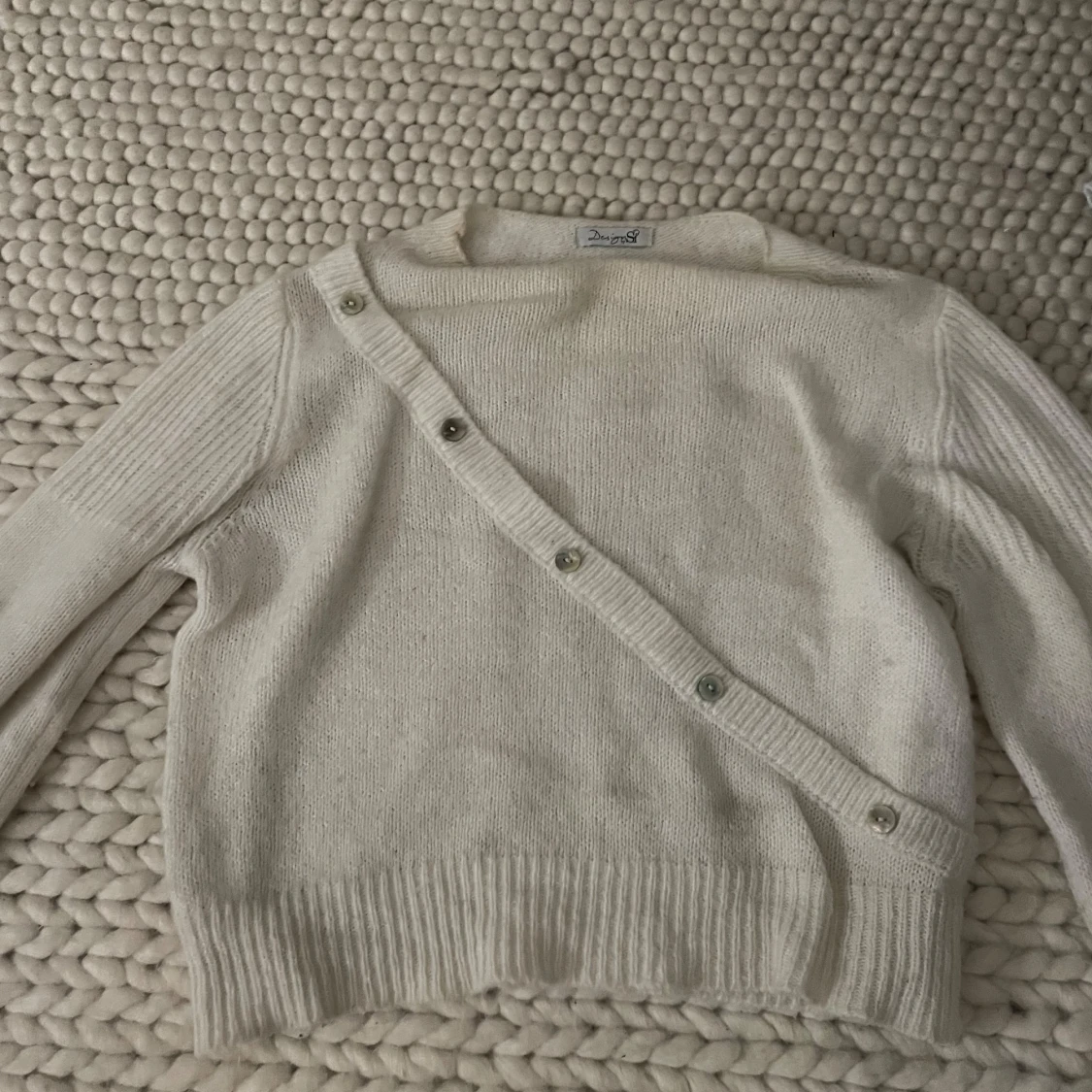 Vit stickad tröja från Design by Si