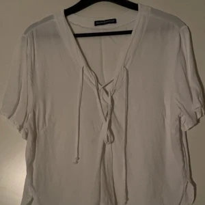 brandy melville tröja - Superfin tröja med snörning från Brandy!!! Köpt från Sellpy, one size men passar XS/S!!