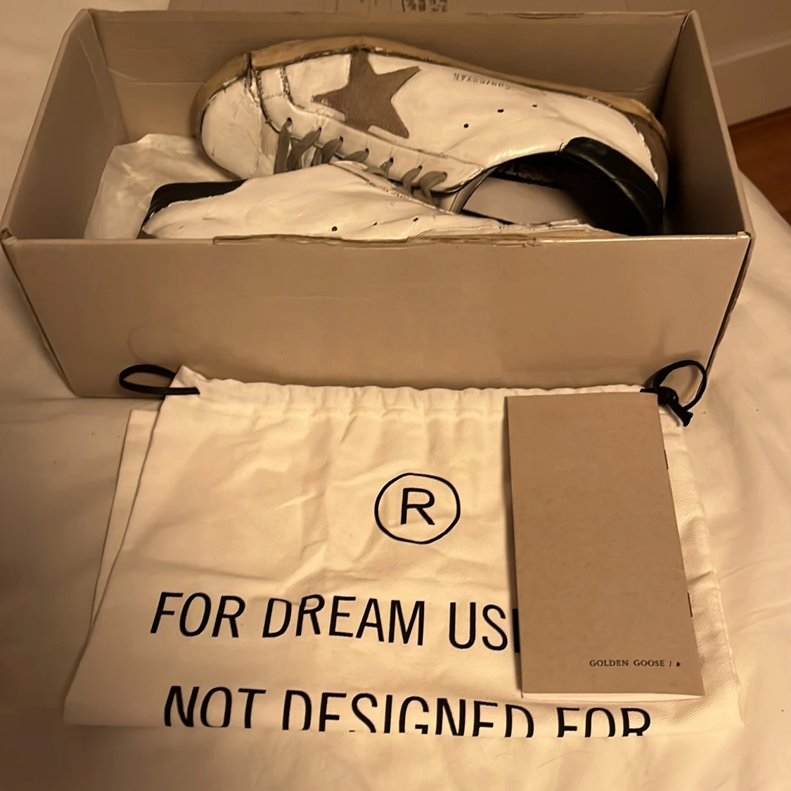 Vita sneakers med stjärndetalj - 91