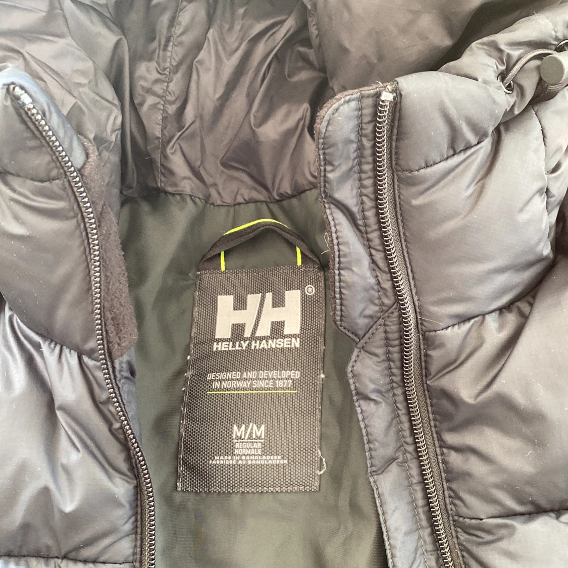 Marinblå dunjacka från Helly Hansen - 91