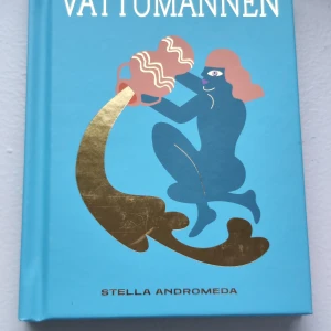 Vattumannen - En bok om stjärntecknet 'vattumannen', lite repig på omslaget men förövrigt i toppskick.