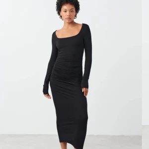 Lång tajt klänning - Endast använd en gång, så super skick.