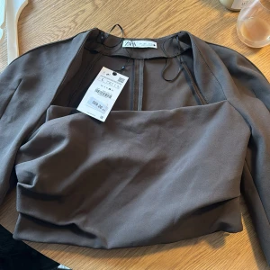 Festtopp  - Topp som passar S-M 