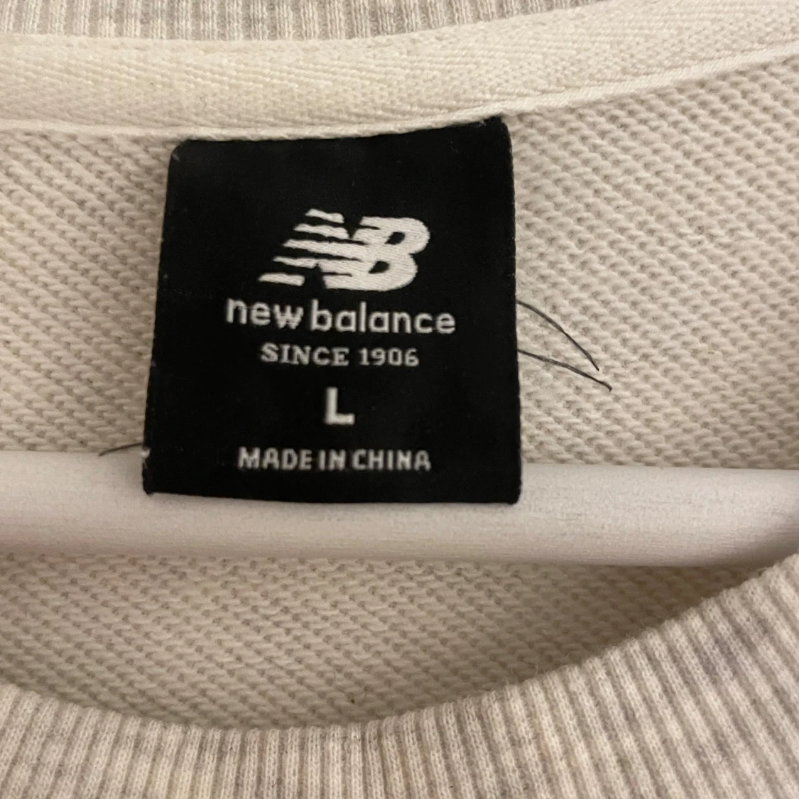 Grå sweatshirt från New Balance - 1