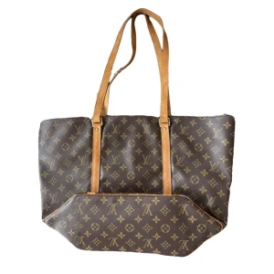 Vintage Louis Vuitton tote bag  - Snygg väska från Louis Vuitton. Köpt på Vestiaire Collective där den genomgått en äkthets kontroll. Vintage så använd men fortfarande fint skick. Stor och rymlig.