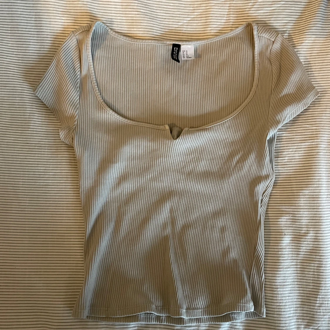 Beige ribbad topp från HM