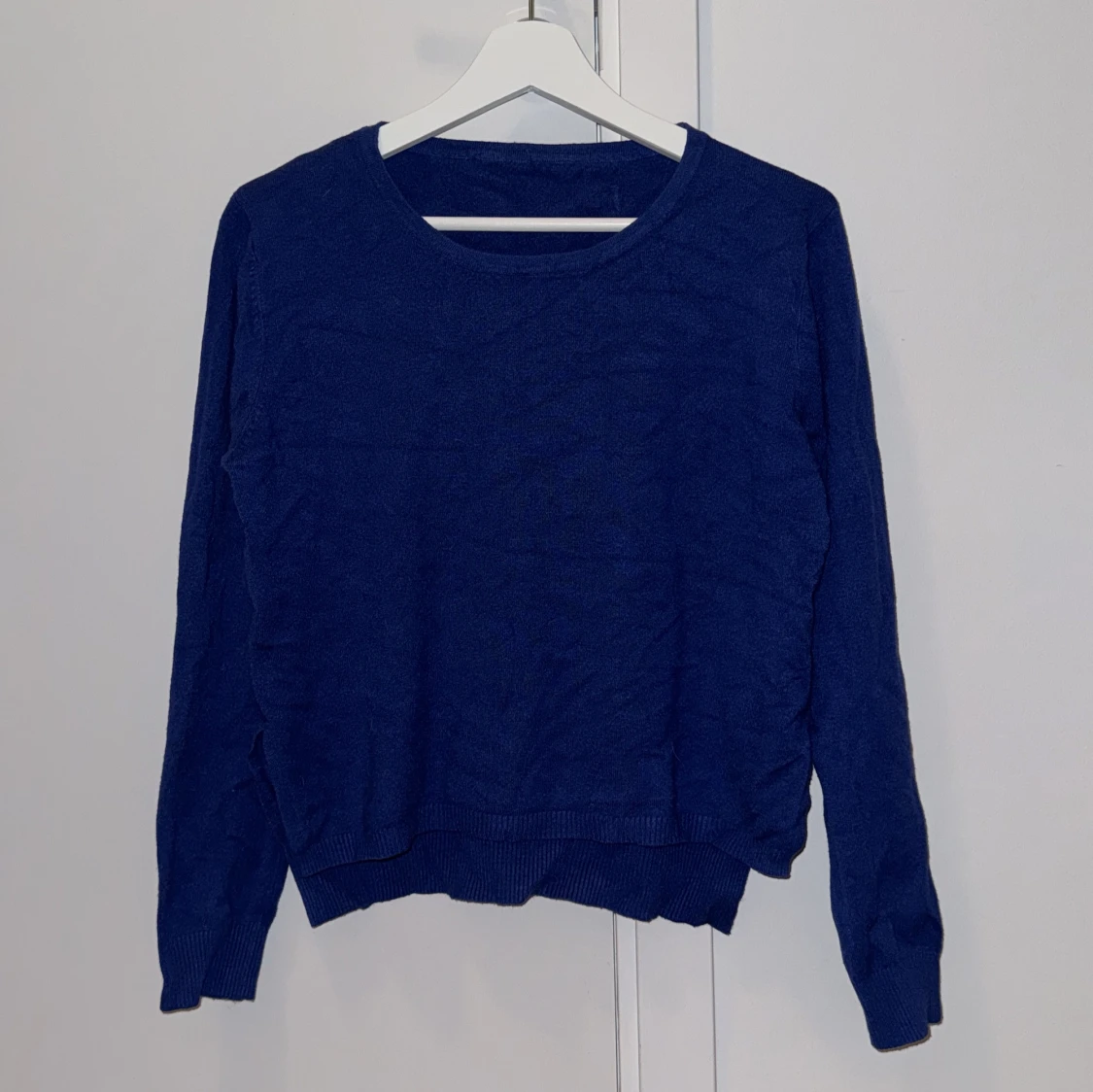Blå stickad tröja