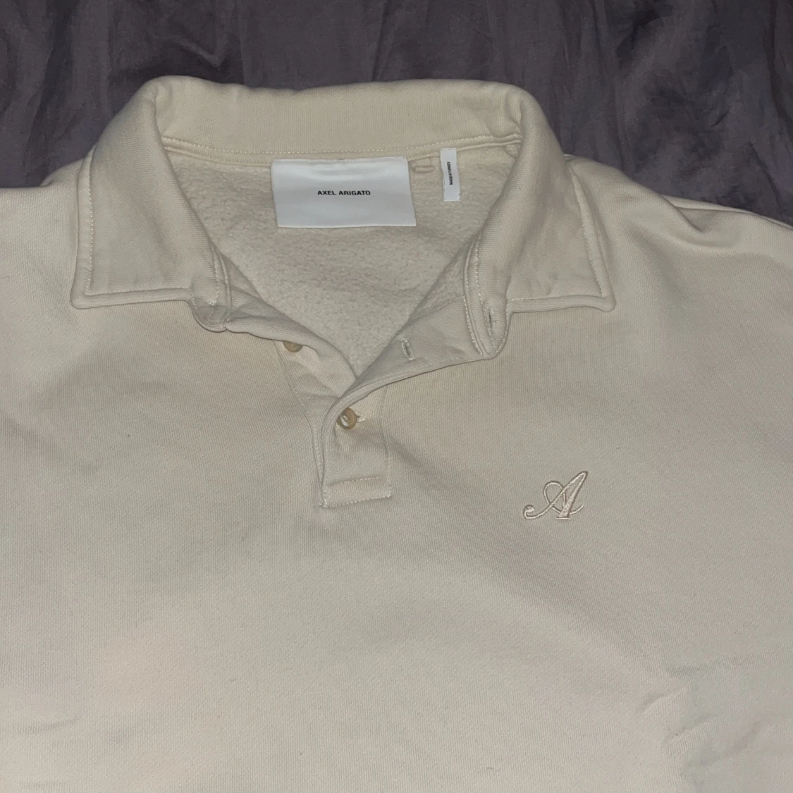 Beige tröja från Axel Arigato