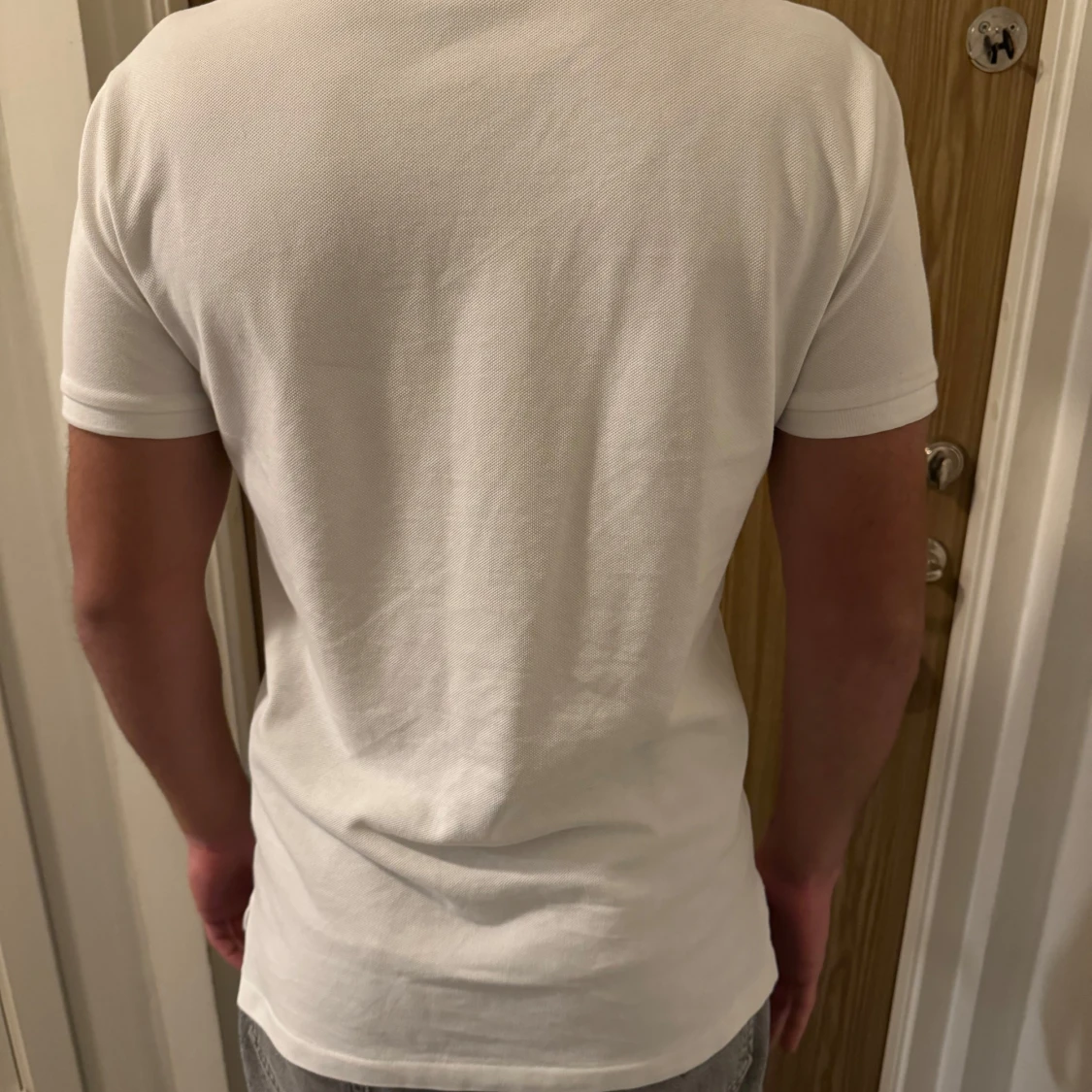 Vit kortärmad pikétröja från Ralph Lauren - 90