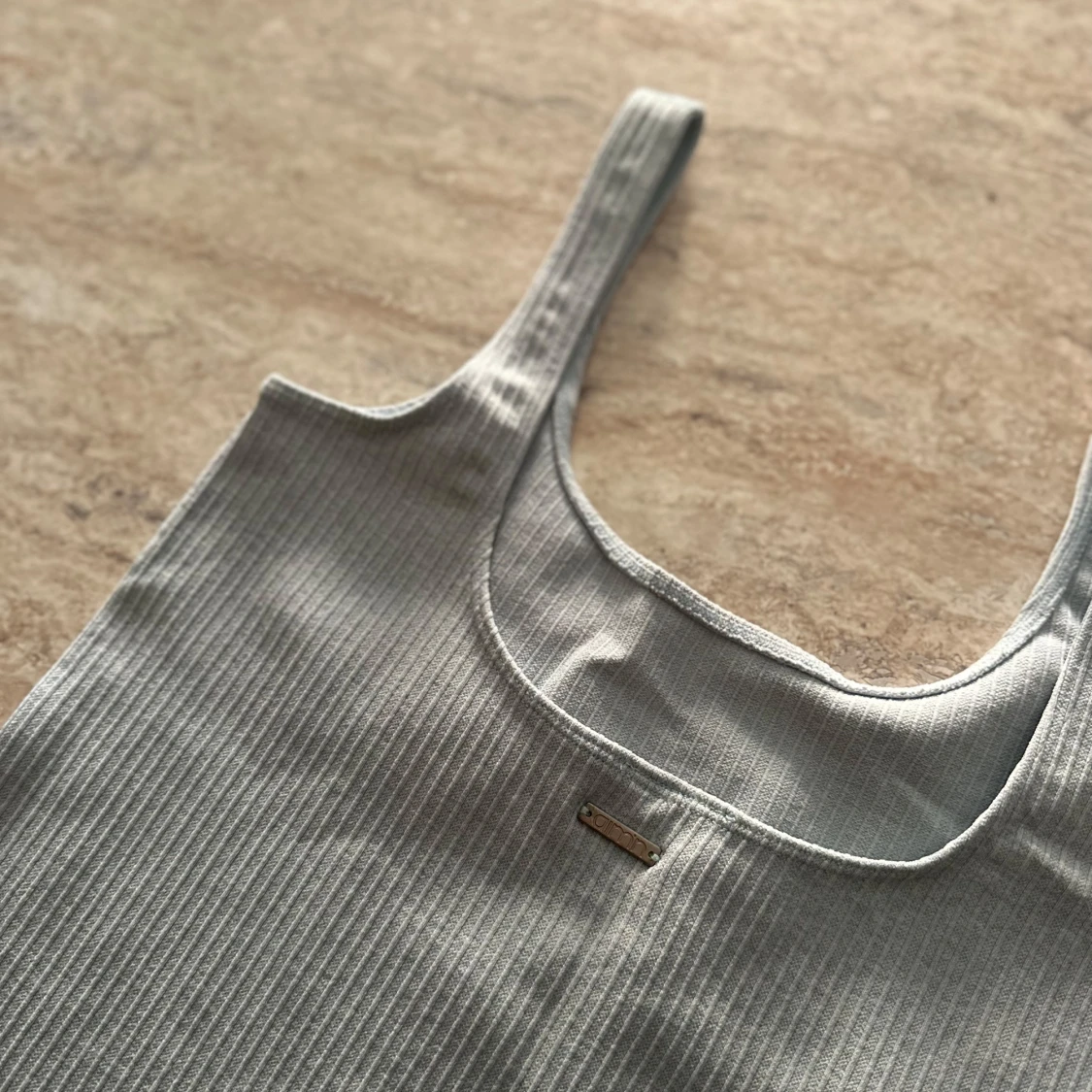 Ljusblått ribbat träningslinne 