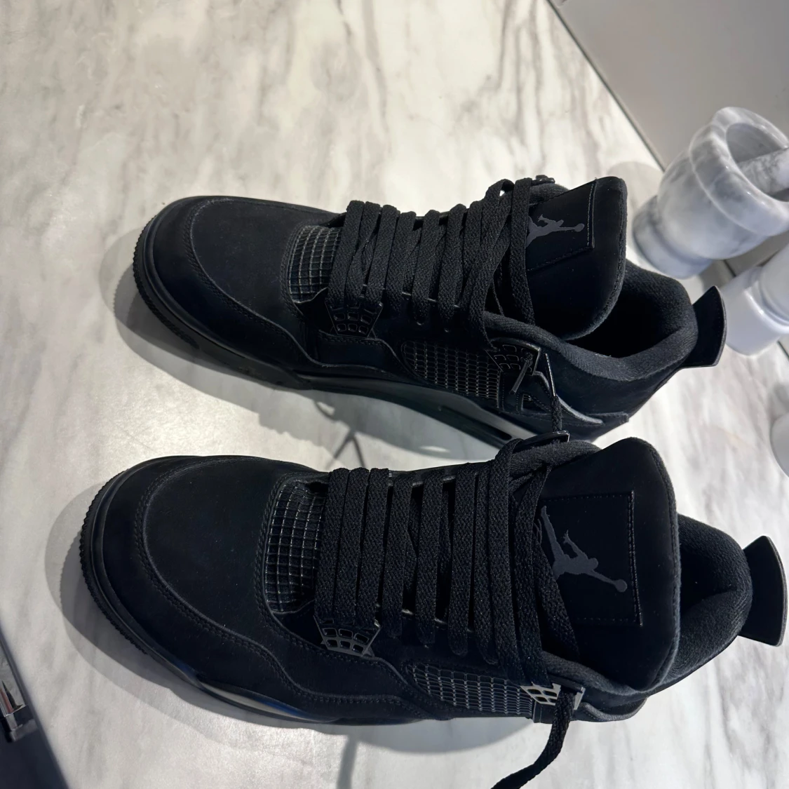 Air Jordan 4 (Black cat)