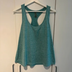 Träningslinne  - Träningslinne, blått. Wide i midjan. Storlek M. 