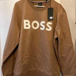 Helt ny tröja från Hugo Boss, storlek xl men passar L . Nypris 1799kr 