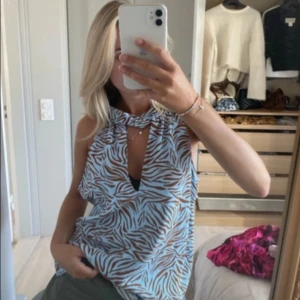 Zebramönstrad ärmlös topp - Zebra topp mönstrad i xs