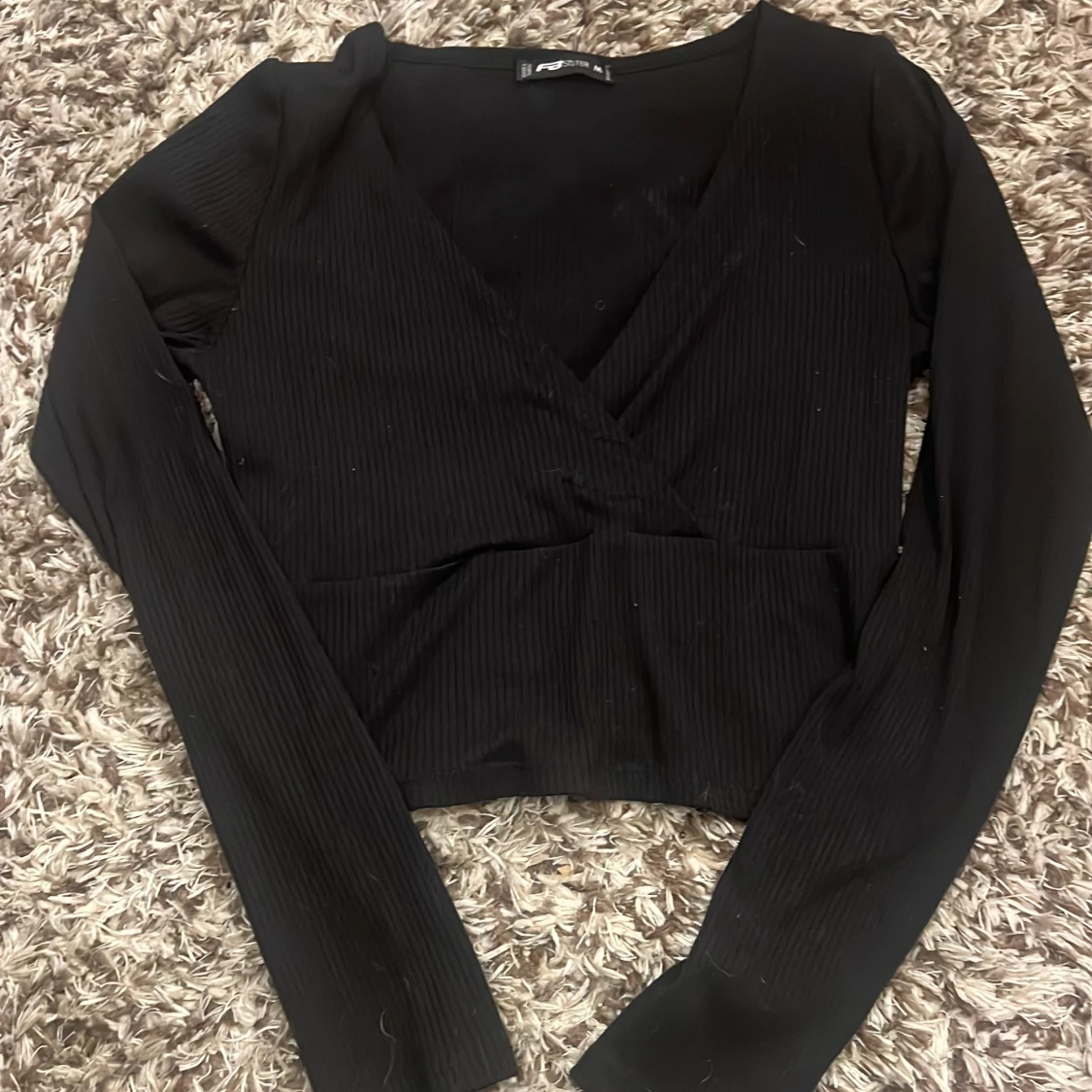 Svart tröja med v-ringning 