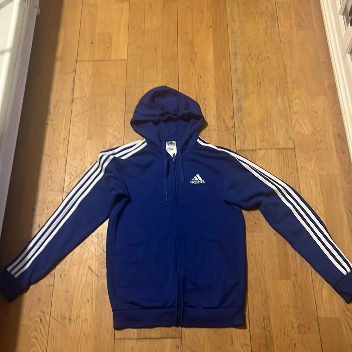 Blå huvtröja från Adidas