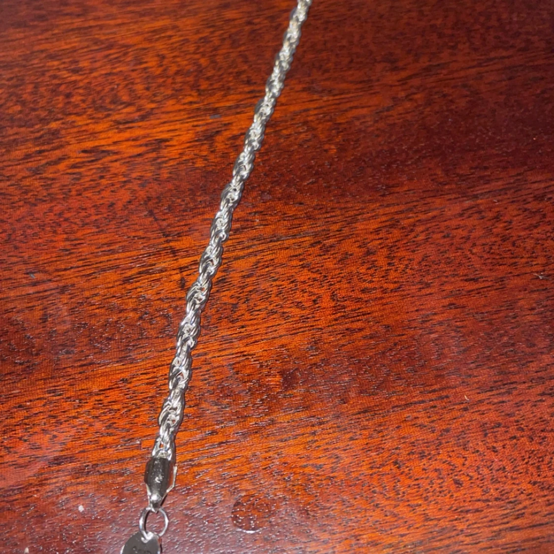 Silverfärgat armband i flätad design - 92