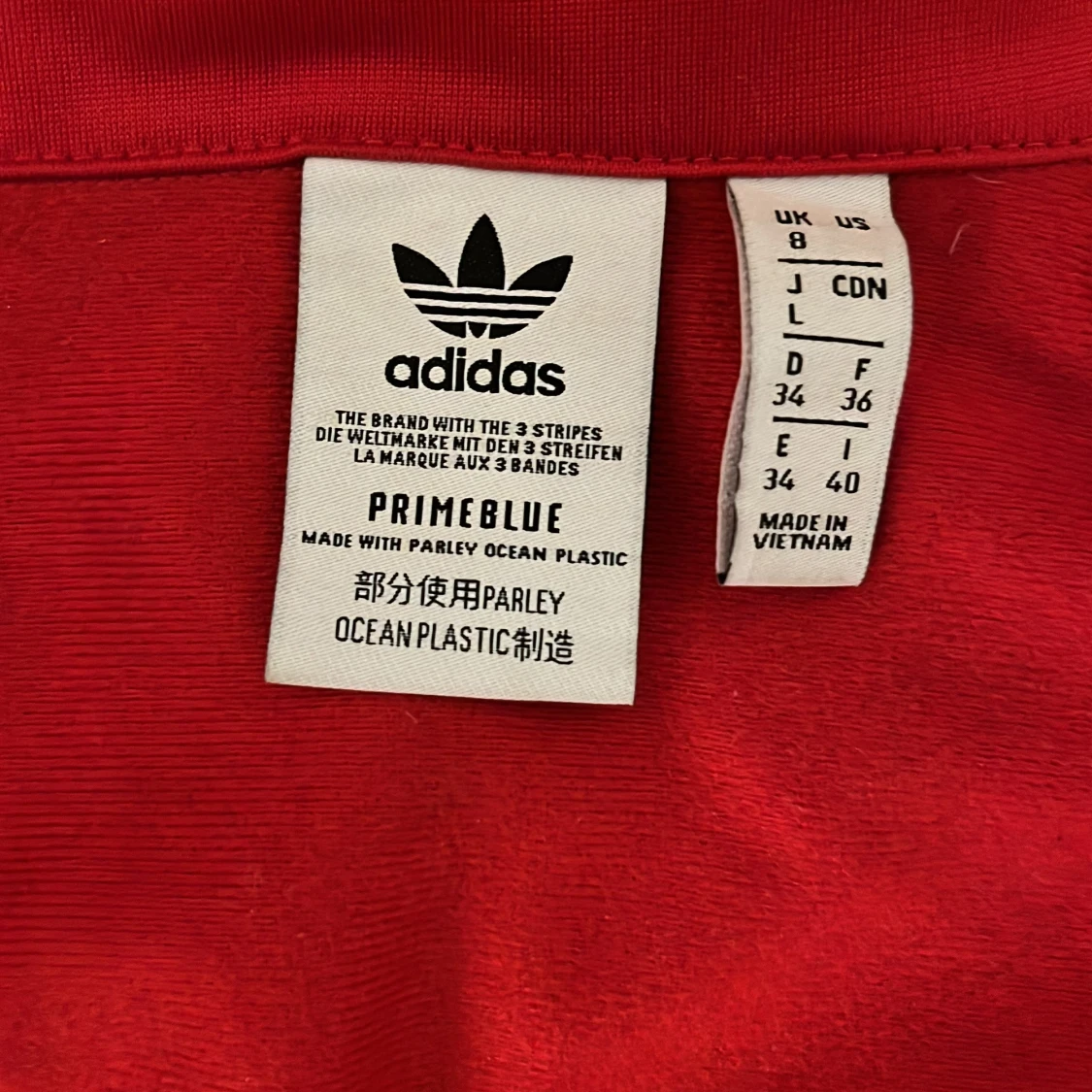 Röd träningsjacka från Adidas - 91