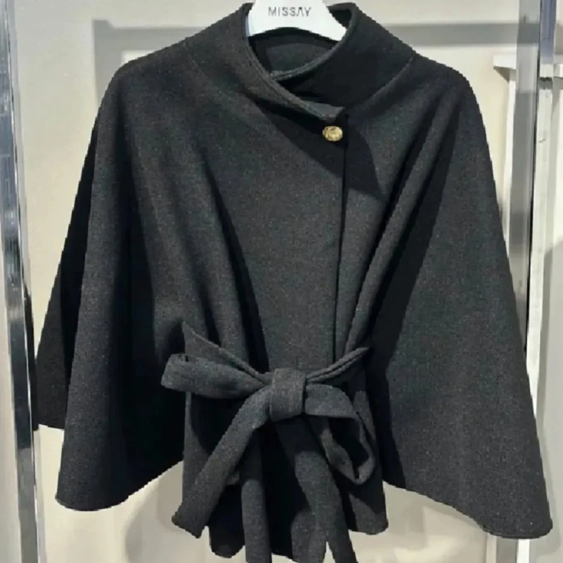 Svart kappa från Missay