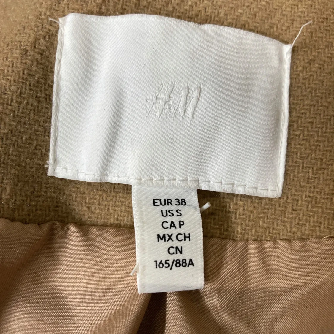 Beige kappa från H&M - 2