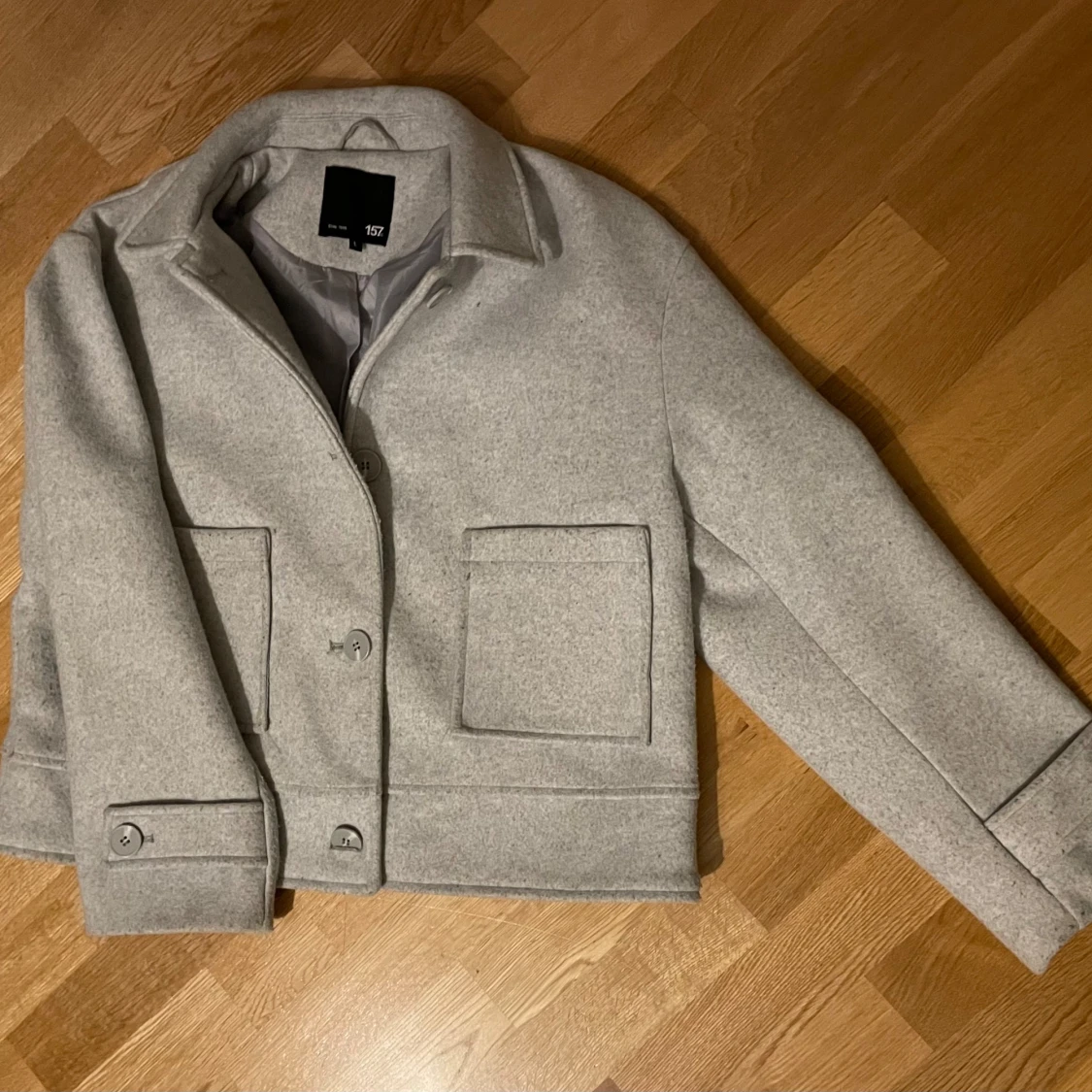 Grå kappa från lager 157 - 1