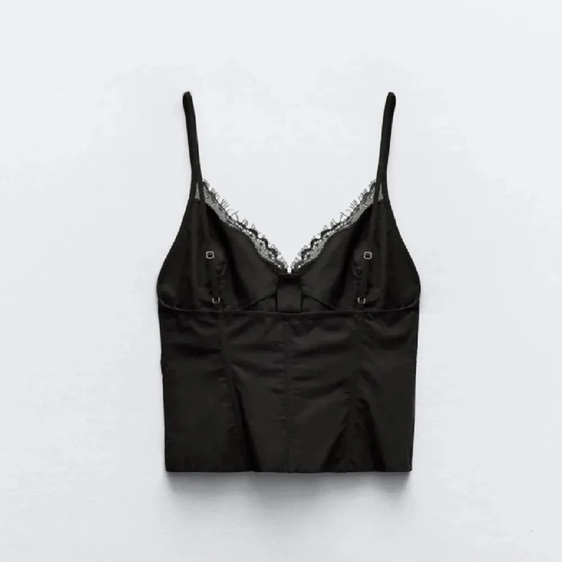 Svart korsett med spetsdetaljer - 2