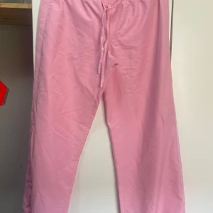 Byxa - Rosa byxor i okänd storlek men skulle säga xs/s