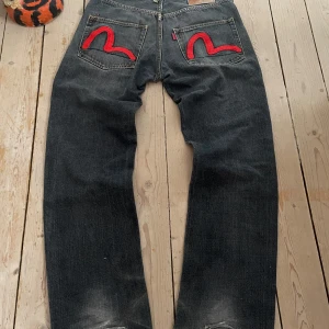 Evisu jeans  - Snygga Evisu jeans, ganska slitna. Priset kan diskuteras 