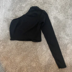 Enarmströja - Svart enarmströja