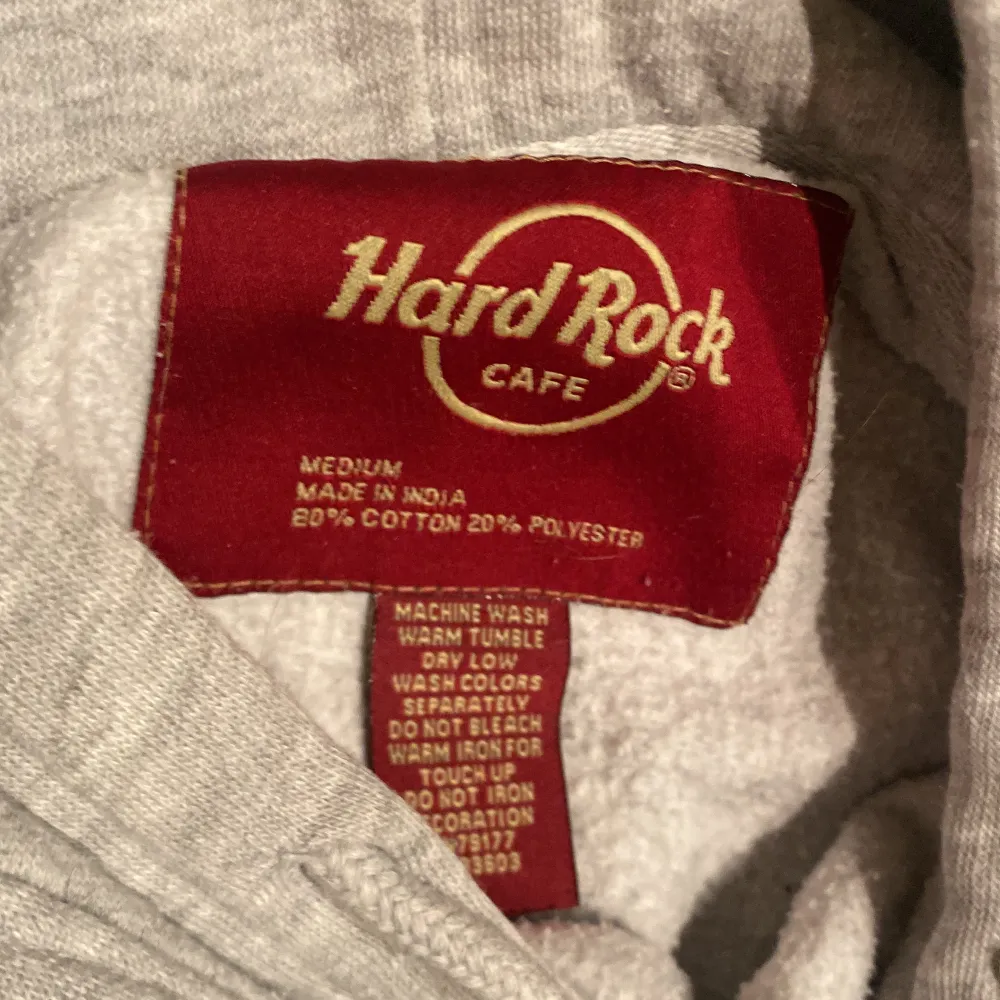Hard Rock Café-Amsterdam gråmelerad hoodie, med tryck fram, fint skick, stl: M. Hoodies.
