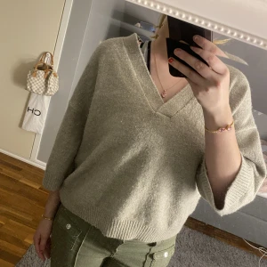 stickad trekvartsärmad  - fin