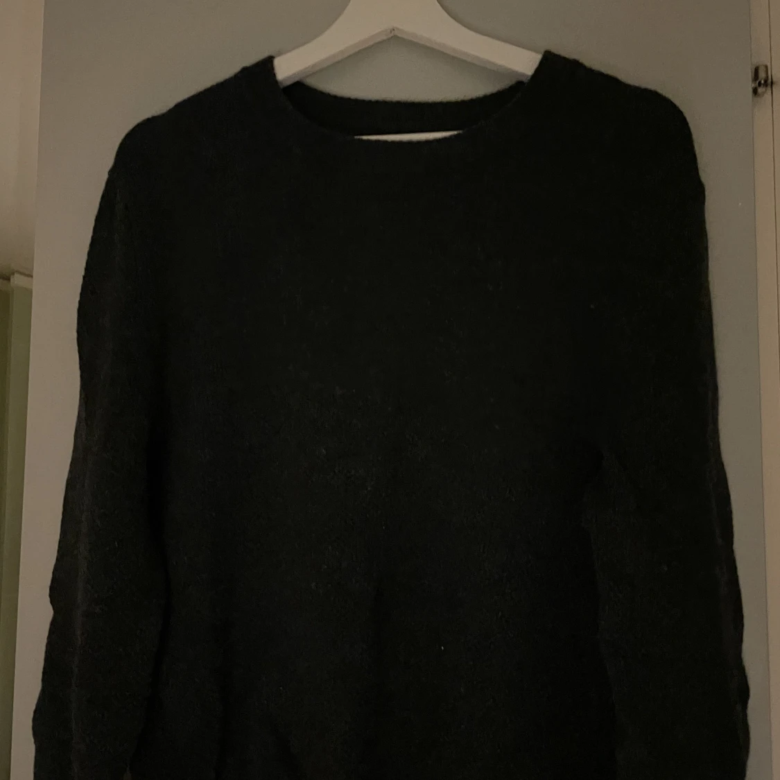 Stickad grön tröja